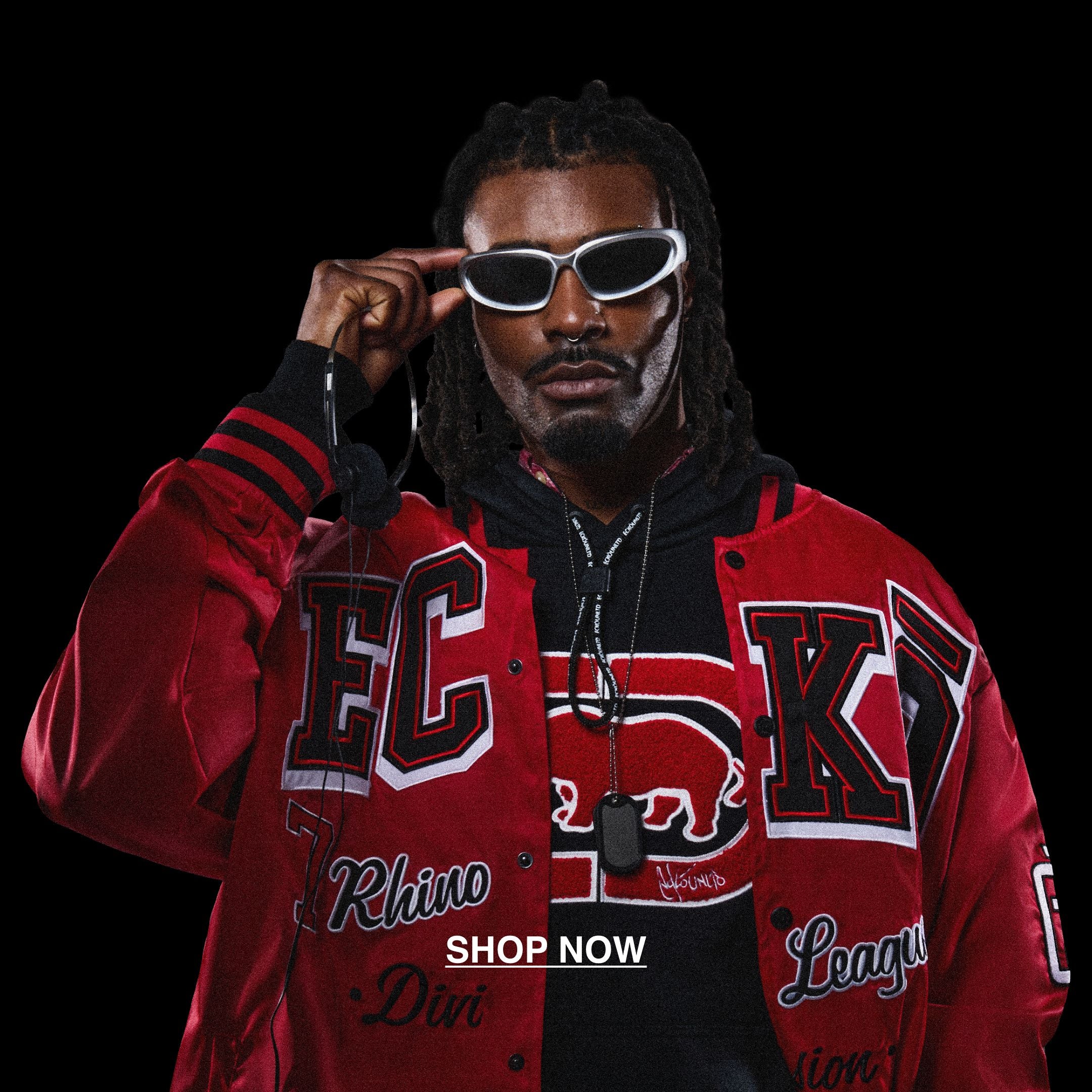 Man wearing a black Ecko Unltd hoodie underneath a red Ecko Unltd varsity jacket. The jacket features a classic letterman style with a large 'ECKO' on the front.